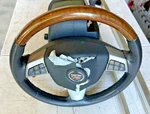 2010 To 2012 Cadillac Srx Leather Wood Steering Wheel W/cruise Control Phone. Fixed Price $50.00.