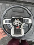 Genuine Ford Steering Wheel HL3Z-3600-FE. Fixed Price $260.00.