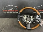 02-05 Lexus SC430 Leather Wrapped Steering Wheel Black Wood. Fixed Price $125.00.