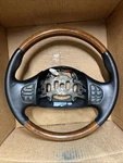 Ford 99-07 Excursion F250 Navigator Leather Wood Wrapped Steering Wheel Audio. Fixed Price $320.00.