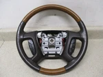 09 To 12 Buick Enclave Steering Wheel, Cruise, Audio Source Control Wood Cocoa. Fixed Price $49.00.