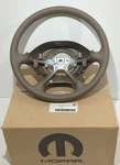 New Oem Genuine Mopar Brown Steering Wheel 2001-2004 Sebring Stratus Sedan Base. Fixed Price $100.00.