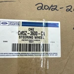 Ford CM5Z-3600-CA Ebony & Plum Leather Steering Wheel 2012-14 Focus Nos. Fixed Price $200.00.
