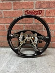 Genuine Oem Black Leather Steering Wheel For 1997-1999 Mitsubishi. Fixed Price $149.99.