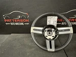 05-07 Ford Mustang Black Leather Wrapped Steering Wheel. Fixed Price $125.00.