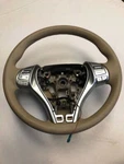 For 2014-2016 Nissan Rogue Beige Polyurethane Steering Wheel 48430-4BA0B. Fixed Price $149.99.