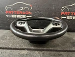 13-19 Ford Taurus Black Leather Wrapped Steering Wheel. Fixed Price $100.00.