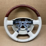2003-2006 Lincoln Navigator Leather Steering Wheel W/ Wood Grain. Fixed Price $89.95.