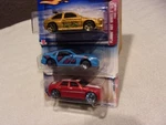 Hot Wheels Flamin' Ford Escort Nissan Custom Z+ Chrysler Hemi 300C P2381 1:64. Fixed Price $9.95.