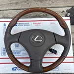 2001-2005 Lexus GS300 GS430 Dark Tan Steering Wheel Pistol Grip Wood Grain. Fixed Price $275.00.