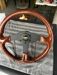 Wood Grain Grip Black Spoke Bow Tie Logo Steering Wheel & Quick Release Combo. Fixed Price $185.00.
