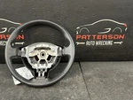08-13 Nissan Rogue Black Leather Wrapped Steering Wheel. Fixed Price $100.00.